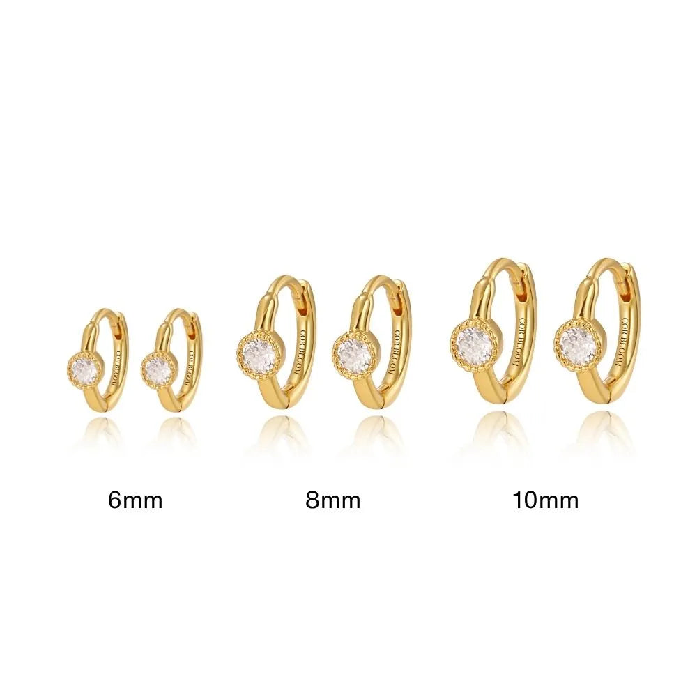 Minimal high-polish hoop with round-cut CZ desgined for second&thirds ...