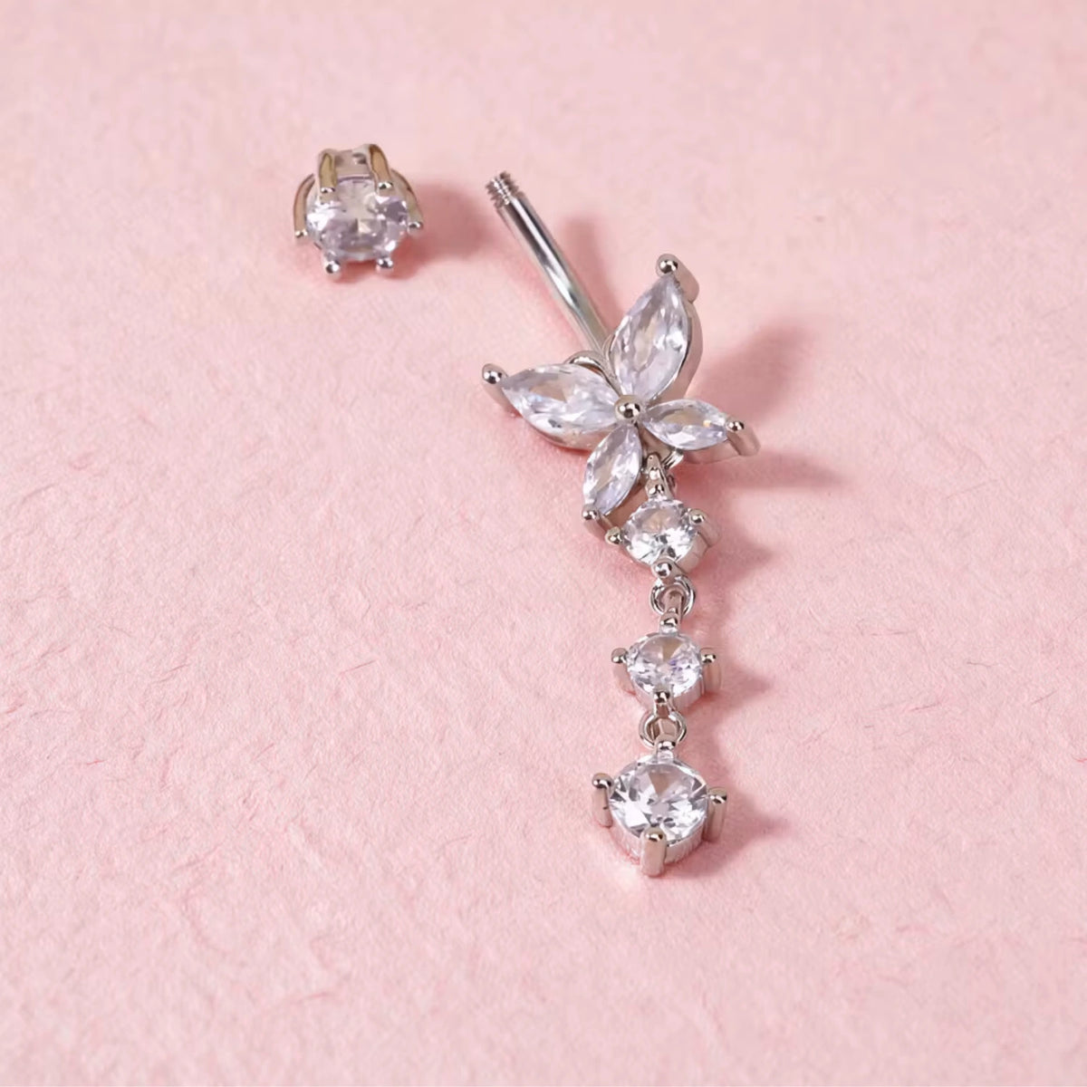 Piercing de nombril papillon pendant
