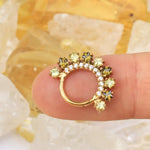 Clicker Phoenix con peridoto taglio quadrato