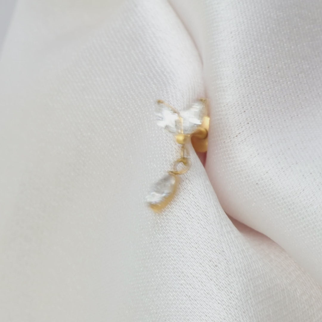 Load video: Titanium Annika Dangling Two Petal Flat Back Stud