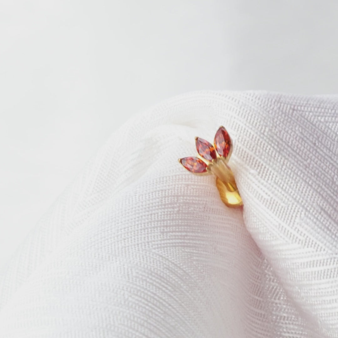 Load video: Titanium Dafni Mini Three-Petal Stud - Red Garnet