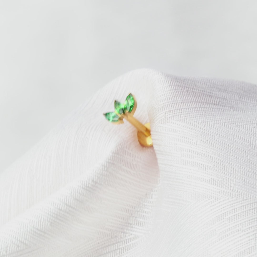 Load video: Titanium Dafni Mini Three-Petal Stud - Green Emerald