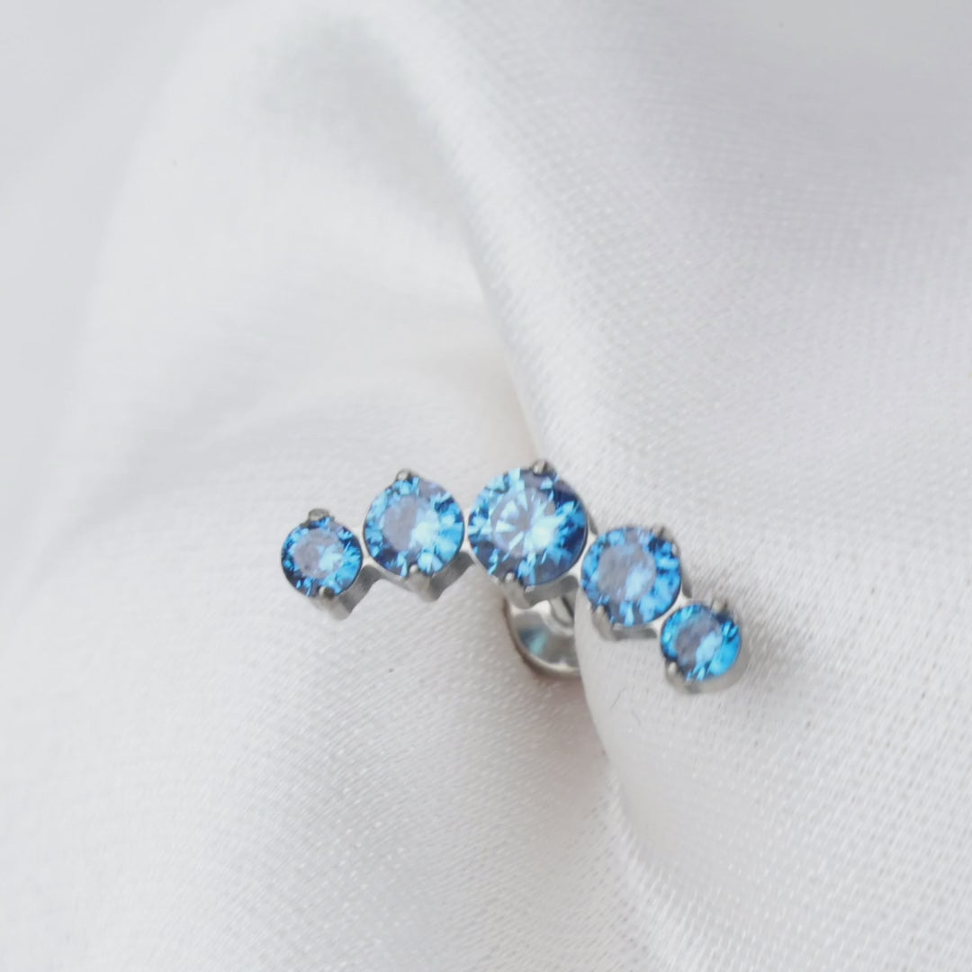 Load video: Titanium Daphne Blue Sapphire Five Stone Cluster Flat Back Stud